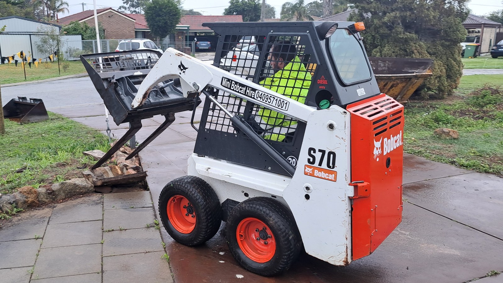 PGR Bobcat skid-steer loader on a Perth clearance site