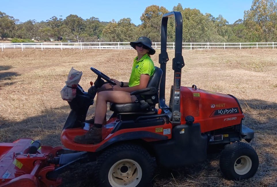 PGR ride-on mower cutting back knee-high grass